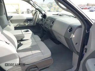 2007 Ford F-150 XLT with VIN 1FTPX14VX7FB18960, listed as a IAAI auction lot 41883749 with 173,716 mi miles. Bid and sale history available at carsss.com. Image 5.