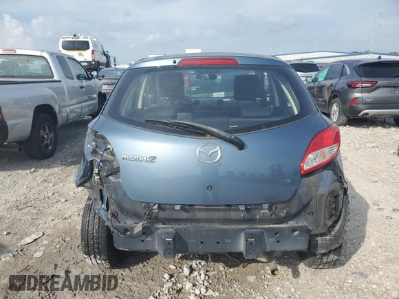 2014 Mazda 2 Sport z VIN JM1DE1KY0E0177473, wystawiony jako Copart lot #60984055 z przebiegiem 88 202 mil mil oraz Szkoda całkowita • Salvage title. Historia ofert i sprzedaży dostępna na DreamBid. Obrazek 6.