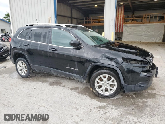 2018 Jeep Cherokee Latitude with VIN 1C4PJLCB5JD595996, listed as a Copart auction lot 57868775 with 135,431 mi miles and Salvage title. Bid and sale history available at DreamBid. Image 4.
