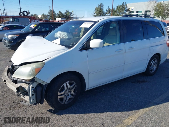 2006 Honda Odyssey EX z VIN 5FNRL38486B410286, wystawiony jako IAAI lot #41641433 z przebiegiem 145 312 mil mil oraz . Historia ofert i sprzedaży dostępna na DreamBid. Obrazek 17.