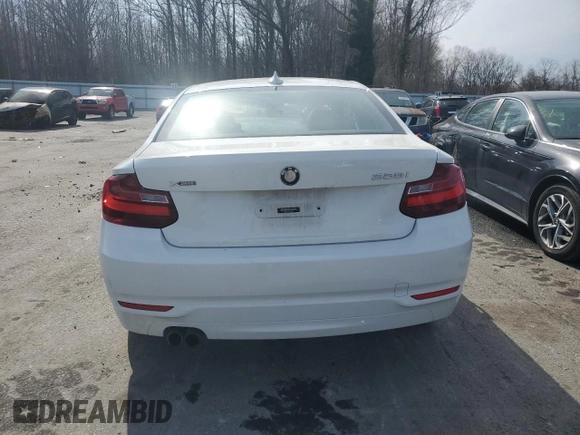 2015 BMW 2 Series 228i xDrive with VIN WBA1F7C57FV367618, listed as a Copart auction lot 49160985 with 63,457 mi miles and Salvage Title. Bid and sale history available at carsss.com. Image 6.