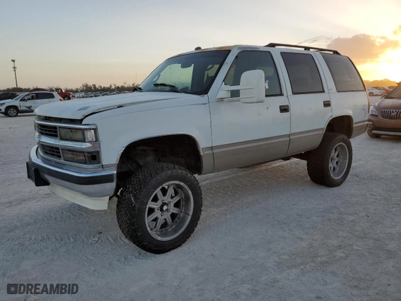 1999 Chevrolet Tahoe with VIN 1GNEC13R2XJ556769, listed as a Copart auction lot 77561624 with 205,238 mi miles and Non Repairable. Bid and sale history available at carsss.com. Image 1.