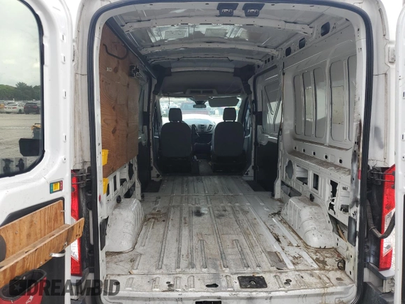 2018 Ford Transit с VIN 1FTYR2DMXJKA77367, выставлен на аукционе Copart как лот 61087535 с пробегом 114 467 миль миль и Чистый • Clean title. История ставок и продаж доступна на DreamBid. Изображение 10.