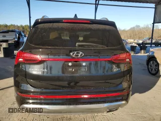 2023 Hyundai Santa Fe Calligraphy with VIN 5NMS54AL0PH557060, listed as a Copart auction lot 87169724 with 31,618 mi miles and Salvage Title. Bid and sale history available at carsss.com. Image 6.