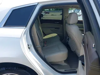 2013 Cadillac SRX Performance Collection z VIN 3GYFNDE35DS578495, wystawiony jako IAAI lot #42323061 z przebiegiem 160 473 mil mil oraz . Historia ofert i sprzedaży dostępna na DreamBid. Obrazek 8.