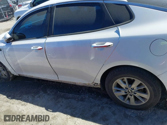 2016 Kia Optima LX with VIN KNAGT4L39G5073865, listed as a IAAI auction lot 41675211 with 120,751 mi miles. Bid and sale history available at carsss.com. Image 14.