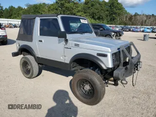1987 Suzuki Samurai z VIN JS3JC51C3H4186141, wystawiony jako Copart lot #72551804 z przebiegiem 525 030 mil mil oraz Szkody całkowita. Historia ofert i sprzedaży dostępna na DreamBid. Obrazek 4.