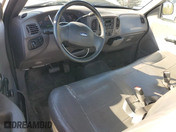 2003 Ford F-150 XL with VIN 2FTRF17WX3CB10461, listed as a Copart auction lot 48663195 with 94,954 mi miles and Salvage Title. Bid and sale history available at DreamBid. Image 8.