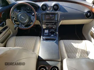 2017 Jaguar XJ with VIN SAJWJ2GD4H8W12163, listed as a Copart auction lot 86993064 with 63,697 mi miles and Salvage Title. Bid and sale history available at carsss.com. Image 8.