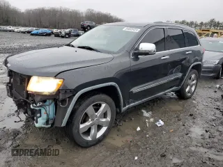 2011 Jeep Grand Cherokee Overland with VIN 1J4RS6GG5BC588562, listed as a Copart auction lot 84805424 with 150,030 mi miles and Salvage Title. Bid and sale history available at DreamBid. Image 1.