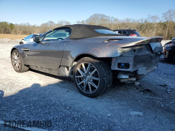 2014 Aston Martin Vantage z VIN SCFEKBBK3EGD18661, wystawiony jako Copart lot #86366204 z przebiegiem 14 863 mil mil oraz Szkoda całkowita • Salvage title. Historia ofert i sprzedaży dostępna na DreamBid. Obrazek 2.