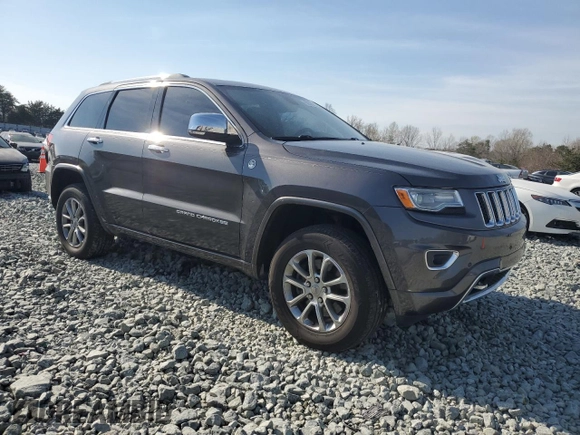 2015 Jeep Grand Cherokee Overland with VIN 1C4RJFCMXFC237723, listed as a Copart auction lot 50318145 with 103,741 mi miles and Salvage title. Bid and sale history available at DreamBid. Image 4.