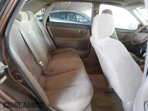 2000 Toyota Avalon XL z VIN 4T1BF28B3YU045264, wystawiony jako Copart lot #57519185 z przebiegiem 157 113 mil mil oraz Szkoda całkowita • Salvage title. Historia ofert i sprzedaży dostępna na DreamBid. Obrazek 10.