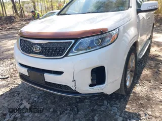 2014 Kia Sorento SX with VIN 5XYKW4A72EG492736, listed as a IAAI auction lot 42009349 with 165,492 mi miles. Bid and sale history available at carsss.com. Image 6.
