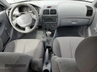 2003 Hyundai Accent GL with VIN KMHCG35C13U270585, listed as a Copart auction lot 50197935 with 53,822 mi miles and Salvage Title. Bid and sale history available at carsss.com. Image 8.