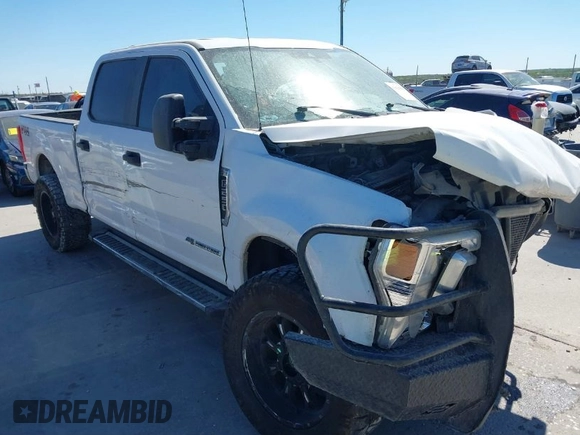 2021 Ford Super Duty F-250 SRW XL with VIN 1FT7W2BT3MEC30933, listed as a IAAI auction lot 41836915 with 100,089 mi miles. Bid and sale history available at carsss.com. Image 1.