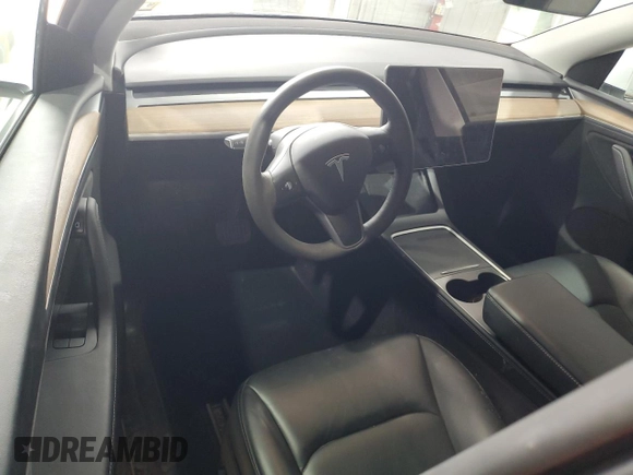 2024 Tesla Model Y Long Range с VIN 7SAYGDEE8RA266519, выставлен на аукционе Copart как лот 60899095 с пробегом Не указан миль и Списание • Salvage title. История ставок и продаж доступна на DreamBid. Изображение 8.