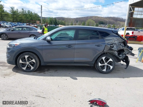 2016 Hyundai Tucson Sport with VIN KM8J33A2XGU022633, listed as a IAAI auction lot 41990348 with 73,395 mi miles. Bid and sale history available at carsss.com. Image 15.