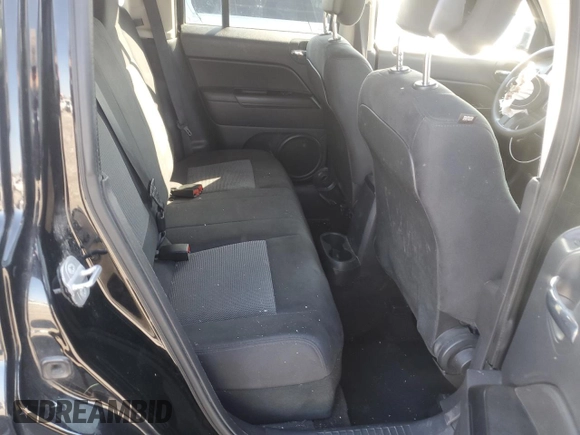 2014 Jeep Patriot Sport z VIN 1C4NJPBA9ED769615, wystawiony jako Copart lot #56385725 z przebiegiem 185 603 mil mil oraz Szkoda całkowita • Salvage title. Historia ofert i sprzedaży dostępna na DreamBid. Obrazek 10.