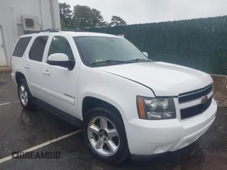 2009 Chevrolet Tahoe 2LT z VIN 1GNFC23059R217780, wystawiony jako IAAI lot #42334678 z przebiegiem 136 182 mil mil oraz . Historia ofert i sprzedaży dostępna na DreamBid. Obrazek 1.