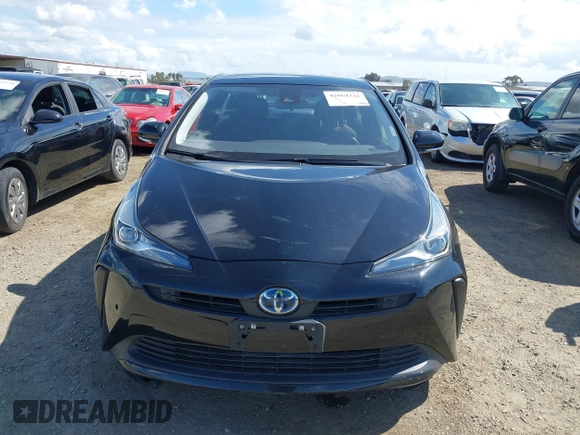 2021 Toyota Prius L Eco with VIN JTDKAMFU6M3135799, listed as a IAAI auction lot 42064241 with 77,120 mi miles and . Bid and sale history available at DreamBid. Image 12.