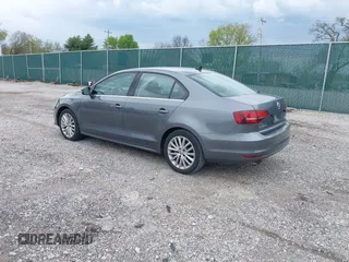 2016 Volkswagen Jetta Sedan 1.8T SEL with VIN 3VWL17AJ0GM213058, listed as a IAAI auction lot 41984066 with 67,014 mi miles. Bid and sale history available at carsss.com. Image 3.