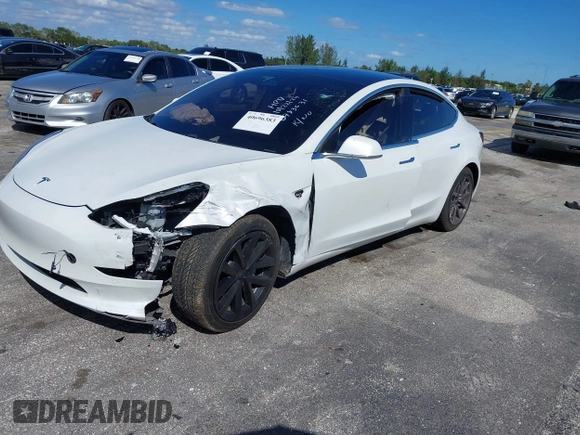 2020 Tesla Model 3 Standard Range Plus with VIN 5YJ3E1EA8LF783631, listed as a IAAI auction lot 40696383 with 78,889 mi miles. Bid and sale history available at carsss.com. Image 16.