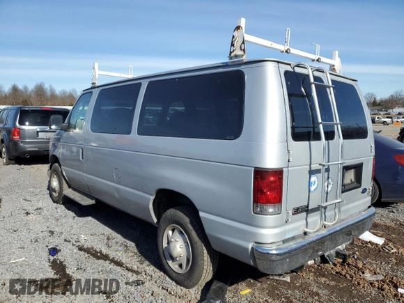 2005 Ford Econoline Passenger XL with VIN 1FBNE31LX5HA76002, listed as a Copart auction lot 43599865 with 198,749 mi miles and Salvage Title. Bid and sale history available at carsss.com. Image 2.