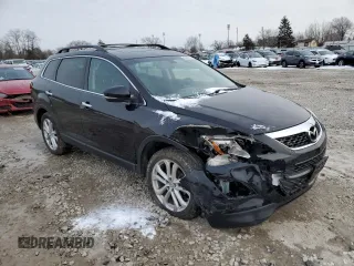2011 Mazda CX-9 Grand Touring with VIN JM3TB3DA9B0316583, listed as a Copart auction lot 45943295 with 166,442 mi miles and Salvage Title. Bid and sale history available at DreamBid. Image 4.
