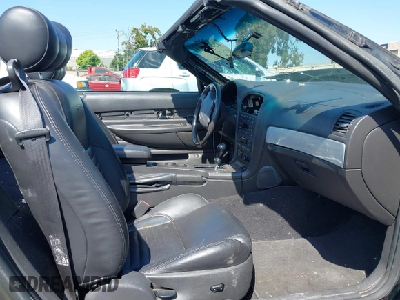 2002 Ford Thunderbird Hardtop Premium z VIN 1FAHP60A82Y103848, wystawiony jako IAAI lot #42467093 z przebiegiem Nie podano mil oraz . Historia ofert i sprzedaży dostępna na DreamBid. Obrazek 5.
