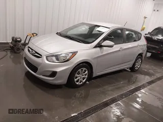 2014 Hyundai Accent GS with VIN KMHCT5AE4EU150877, listed as a IAAI auction lot 41989235 with 68,918 mi miles. Bid and sale history available at carsss.com. Image 2.