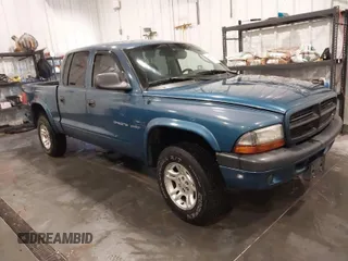 2002 Dodge Dakota Sport with VIN 1B7HG38N42S677575, listed as a IAAI auction lot 41727836 with 155,002 mi miles. Bid and sale history available at carsss.com. Image 1.