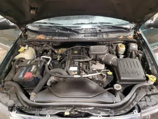 2000 Jeep Grand Cherokee Laredo with VIN 1J4GW48S2YC256123, listed as a Copart auction lot 56015855 with 147,549 mi miles and Salvage title. Bid and sale history available at DreamBid. Image 12.