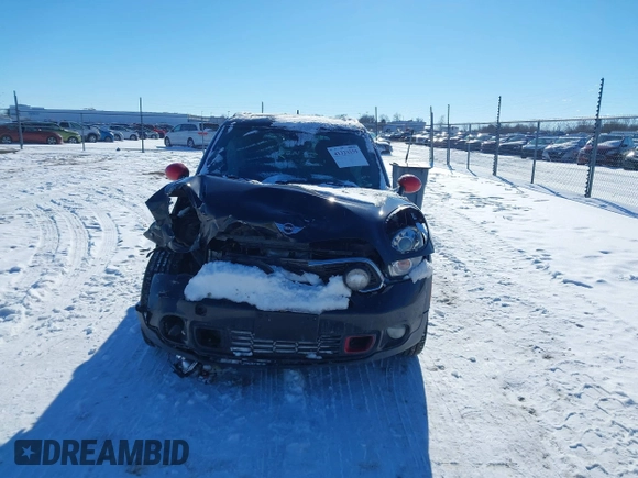 2011 MINI Countryman S with VIN WMWZC5C50BWL55234, listed as a IAAI auction lot 41323339 with 134,709 mi miles and . Bid and sale history available at DreamBid. Image 13.