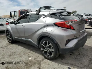 2020 Toyota C-HR LE with VIN JTNKHMBX7L1065098, listed as a Copart auction lot 50101395 with 51,933 mi miles and Salvage Title. Bid and sale history available at DreamBid. Image 2.
