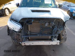 2016 Toyota Tacoma SR with VIN 3TMCZ5AN0GM023263, listed as a IAAI auction lot 41302069 with 137,276 mi miles and . Bid and sale history available at DreamBid. Image 13.