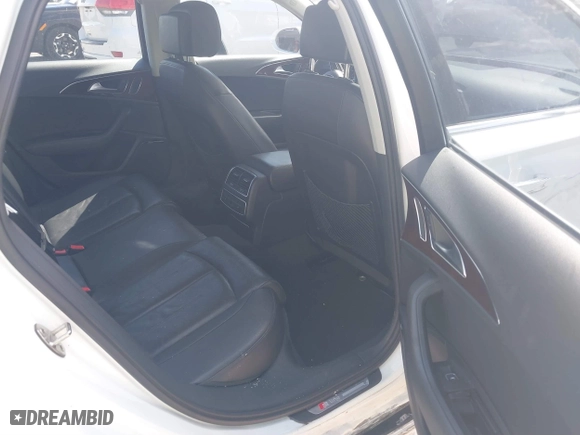 2016 Audi A6 3.0T Premium Plus with VIN WAUFGAFC9GN003664, listed as a IAAI auction lot 41890962 with 100,485 mi miles. Bid and sale history available at carsss.com. Image 8.