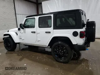 2023 Jeep Wrangler Sahara z VIN 1C4JJXP61PW696072, wystawiony jako Copart lot #57859545 z przebiegiem 42 136 mil mil oraz Czysty tytuł • Clean title. Historia ofert i sprzedaży dostępna na DreamBid. Obrazek 2.