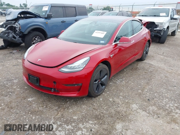 2018 Tesla Model 3 Long Range Battery z VIN 5YJ3E1EB8JF119898, wystawiony jako IAAI lot #42297445 z przebiegiem 29 555 mil mil oraz . Historia ofert i sprzedaży dostępna na DreamBid. Obrazek 20.