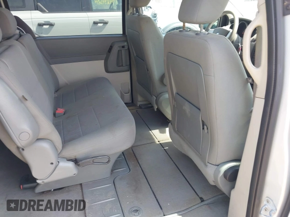 2008 Dodge Grand Caravan SE with VIN 2D8HN44H58R797943, listed as a IAAI auction lot 42073540 with 161,596 mi miles and . Bid and sale history available at DreamBid. Image 8.