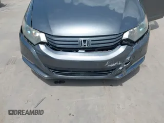 2010 Honda Insight EX with VIN JHMZE2H74AS040110, listed as a IAAI auction lot 42643669 with 189,531 mi miles and . Bid and sale history available at DreamBid. Image 6.