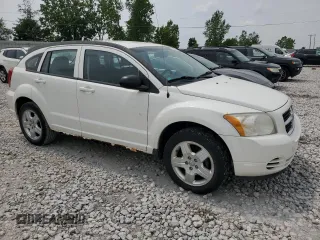 2009 Dodge Caliber SXT z VIN 1B3HB48A89D198108, wystawiony jako Copart lot #58910415 z przebiegiem 176 257 mil mil oraz Czysty tytuł • Clean title. Historia ofert i sprzedaży dostępna na DreamBid. Obrazek 4.