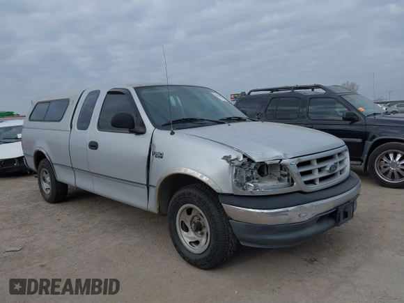 1999 Ford F-150 with VIN 1FTZX1720XKA10512, listed as a IAAI auction lot 41247083 with 169,154 mi miles and . Bid and sale history available at DreamBid. Image 6.