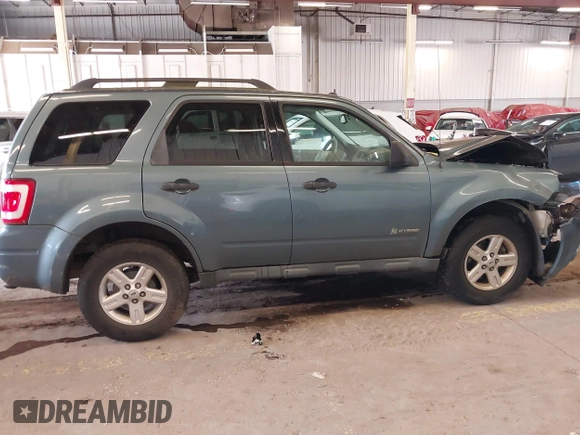 2011 Ford Escape Hybrid with VIN 1FMCU4K31BKC63987, listed as a IAAI auction lot 41987374 with 111,568 mi miles and . Bid and sale history available at DreamBid. Image 14.