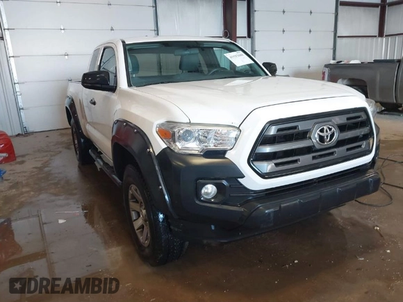 2016 Toyota Tacoma SR z VIN 5TFSX5ENXGX042148, wystawiony jako IAAI lot #41592688 z przebiegiem 126 528 mil mil oraz . Historia ofert i sprzedaży dostępna na DreamBid. Obrazek 1.