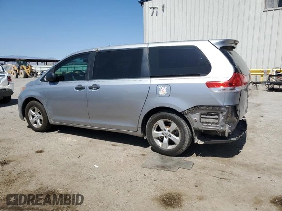 2012 Toyota Sienna with VIN 5TDZK3DC8CS246285, listed as a Copart auction lot 61676185 with 114,700 mi miles and Salvage title. Bid and sale history available at DreamBid. Image 2.