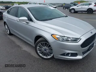 2013 Ford Fusion SE z VIN 3FA6P0H98DR253944, wystawiony jako IAAI lot #42525128 z przebiegiem 104 081 mil mil oraz . Historia ofert i sprzedaży dostępna na DreamBid. Obrazek 1.