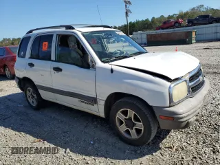 2003 Chevrolet Tracker z VIN 2CNBE13C736912038, wystawiony jako Copart lot #80422844 z przebiegiem 242 512 mil mil oraz Szkoda całkowita • Salvage title. Historia ofert i sprzedaży dostępna na DreamBid. Obrazek 4.