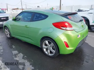 2012 Hyundai Veloster w/Gray Int z VIN KMHTC6AD3CU025315, wystawiony jako IAAI lot #42097741 z przebiegiem 146 726 mil mil oraz . Historia ofert i sprzedaży dostępna na DreamBid. Obrazek 3.