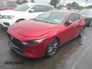 2019 Mazda 3 Preferred z VIN JM1BPAMM2K1135386, wystawiony jako IAAI lot #40367062 z przebiegiem 9 999 mil mil oraz . Historia ofert i sprzedaży dostępna na DreamBid. Obrazek 2.